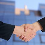 Professionals shaking hands